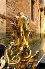 Fototapeta na wymiar closeup of gold decoration on Venetian gondola