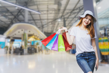 Concept of woman shopping and holding bags.	