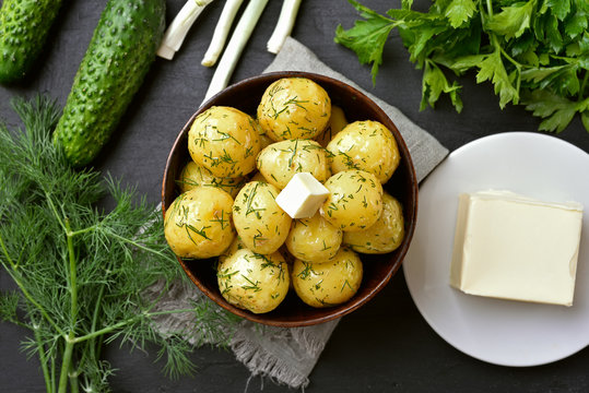 Boiled potatoes with dill and butter