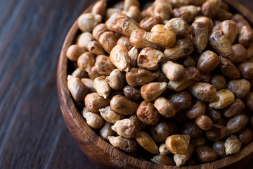 Turkish Snacks Kavurga / Fried Corn Seeds in Wooden Bowl.