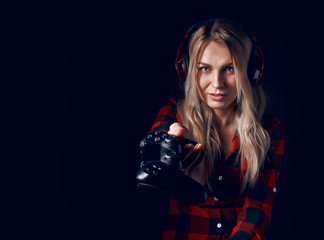 girl gamer offers to play with it and stretches the joystick © Mykhailovskyi