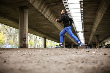 Fototapeta premium Jogging under bridge.