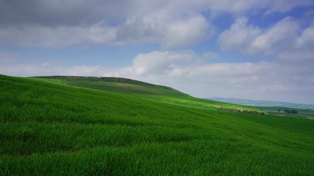 Beatiful landscape with green grass hill in Morocco, Africa, timelapse 4k
