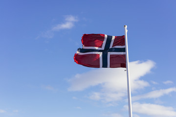 waving norwegian flag in the wind