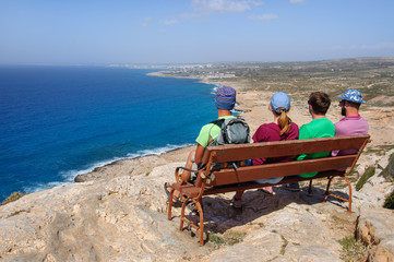 People on bench near the sea, Cyprus, recreation, relaxation