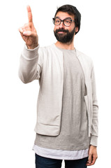 Fototapeta premium Hipster man touching on transparent screen on white background