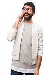 Fototapeta premium Happy Hipster man talking to mobile on white background