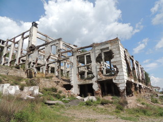 Fototapeta na wymiar Destroyed factory building
