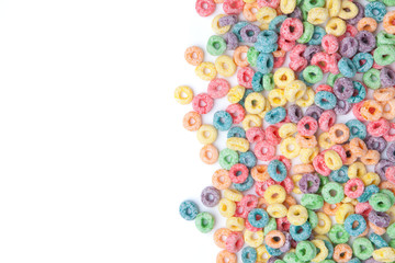 Multicolor cereals with fruity on white background.