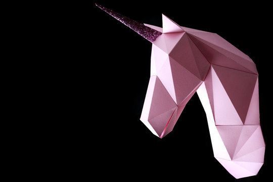 Pink unicorn on a black background. 3d model of a unicorn. Copy space