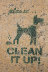 Clean after your dog sign on the street