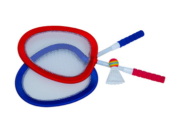 two  rackets in red and blue and a shuttlecock for badminton
