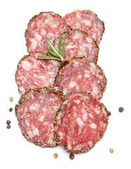 Dried organic salami sausage covered with pepper on white background