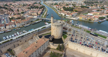 Aerial view of the main tower of the fortress that surrounds the ancient medieval city of Aigues-Mortes. France.