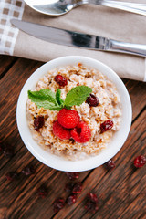 Oatmeal with cranberries and raspberries