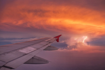 view from plane window at sunset