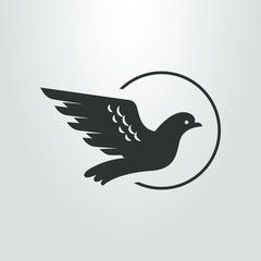 black and white icon of an abstract flying dove