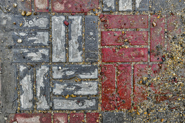 Pavement. Sidewalk tile background. Pavement tile. Top view. Closeup. Footpath. Red and Gray