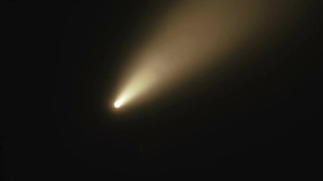 View of flashlight's shadow in darkness of the ancient stone cave