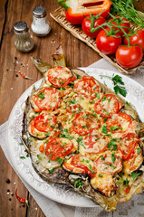 Grilled fish with vegetables and cheese