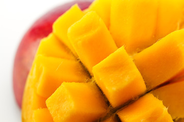 Ripe, juicy and appetizing mango and its parts close-up