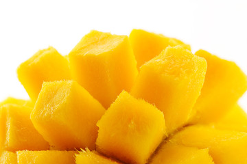 Ripe, juicy and appetizing mango and its parts close-up