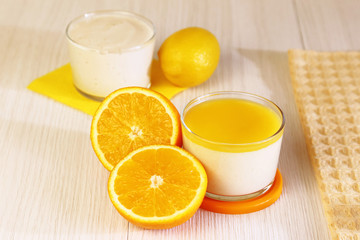Food. Panna cotta. Italian milk fruity dessert made of yogurt and cream with lemon and orange.