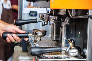 Cafe barista making coffee preparing machine