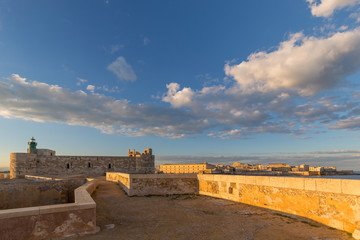 Maniace Castle at sunset (Castello Maniace) in Syracuse, Sicily, Italy