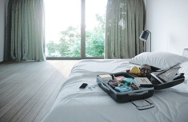 open travel case in hotel bedroom travel vacation concept background