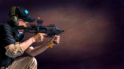 Male aim 9mm pistol gun with conversion kit to carbine and shoot to target in shooting competition isolated on abstract background with clipping path