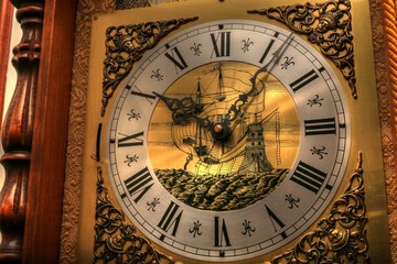 Fototapeta na wymiar Close up of pendulum clock 2