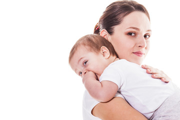 Mother hugs her baby isolated