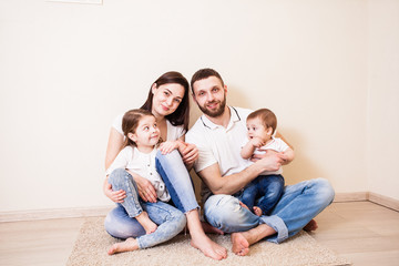 Portrait of a beautiful young family