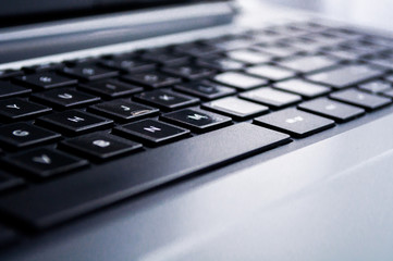 Fototapeta premium Close up of keyboard of a modern laptop.