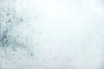 Soap foam and bubbles background. white texture