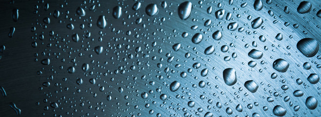 water drops on a metal surface