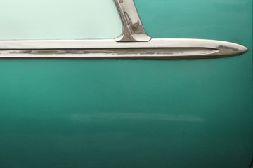 Close up of a green door of a 1950's classic car, in Havana, Cuba.