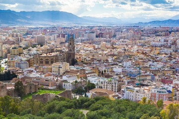 Fototapeta premium Cityscape aerial view of Malaga, Andalucia, Spain. The Cathedral of Malaga