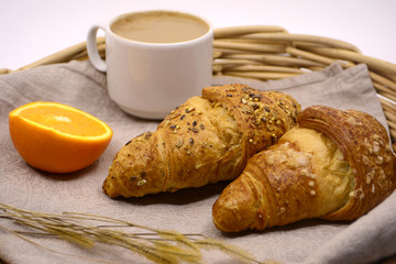 Breakfast with croissants and coffee