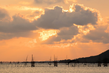 Obraz na płótnie Canvas Sunset ,in the sea water the beautiful sky 
