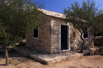 Fototapeta na wymiar Stone hut at Lake Vransko near Pirovac in Croatia 