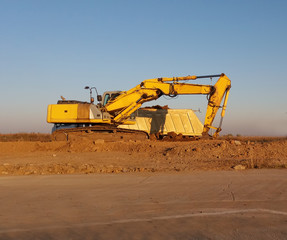 Truck and excavator