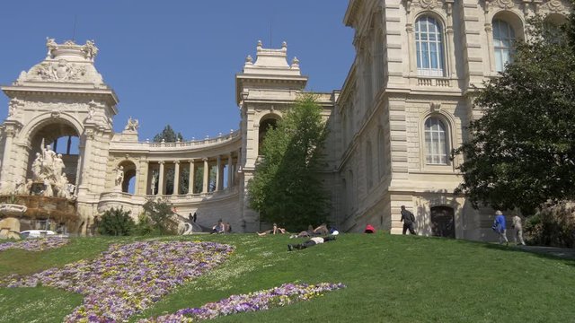 People relaxing near the Palais Longchamp in Marseilles 