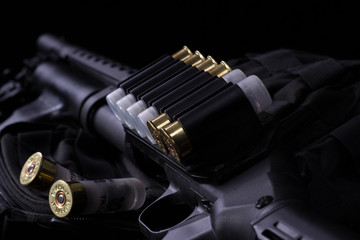 shotgun, shotgun cartridges on a black background