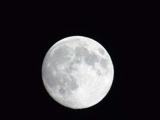 Amazing full moon over the city of Genova in winter days