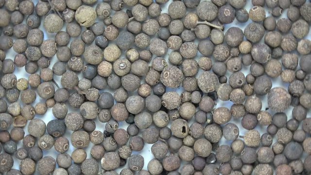 Rotating allspice food background
