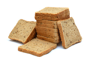 Pile of the sliced bread toasts pieces isolated over the white background