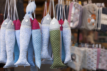 Handmade fish puppets for sale on a street Christmas fair in Budapest, Hungary