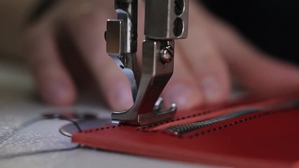 Sewing machine. Sewing of leather goods. Close-up